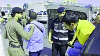 Saudi Arab police arresting