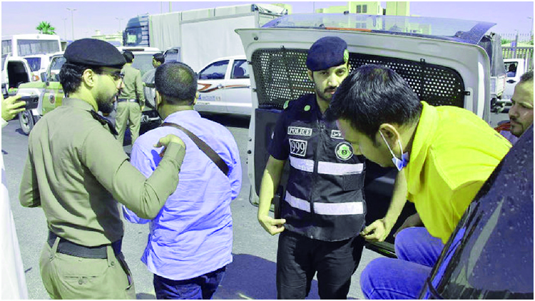 Saudi Arab police arresting